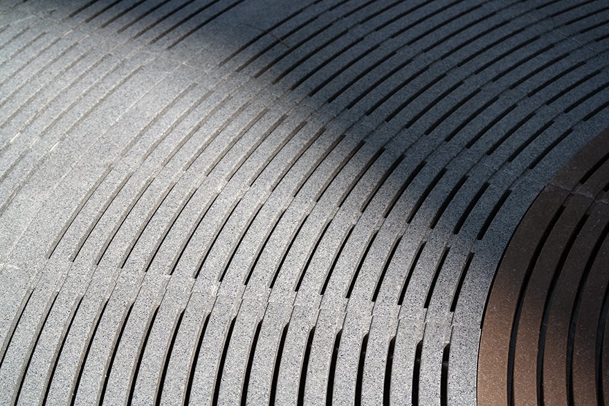 Clean, minimalist Jonite trench channel grates in Wheelock Place