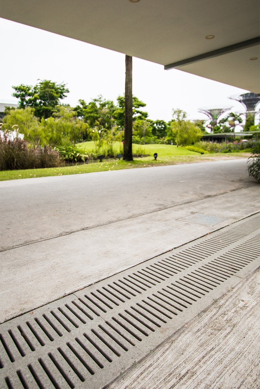 Jonite trench grates can be blended seamlessly into pavers at Gardens by the Bay