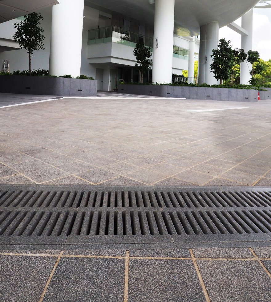 Jonite channel grates used in driveway Kallang Riverside