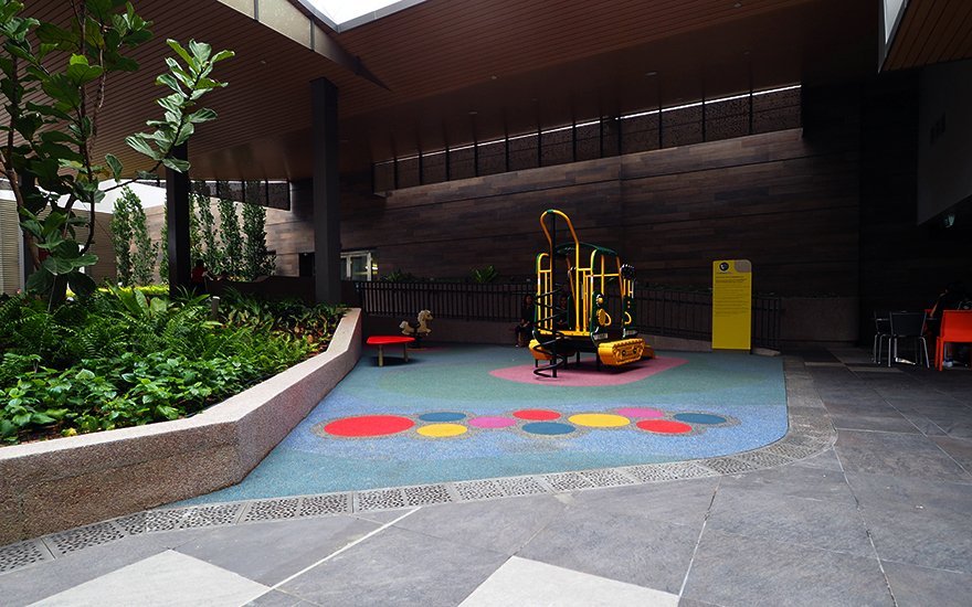 Jonite grates near a children's play area at the Tampines Mall