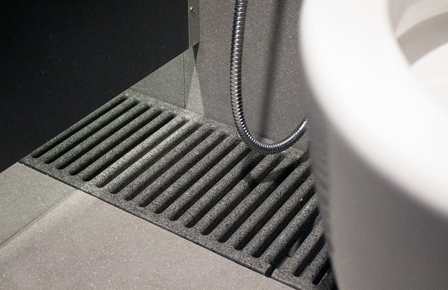 Low water absorption easy cleaning Jonite bathroom grates in Singpost Centre