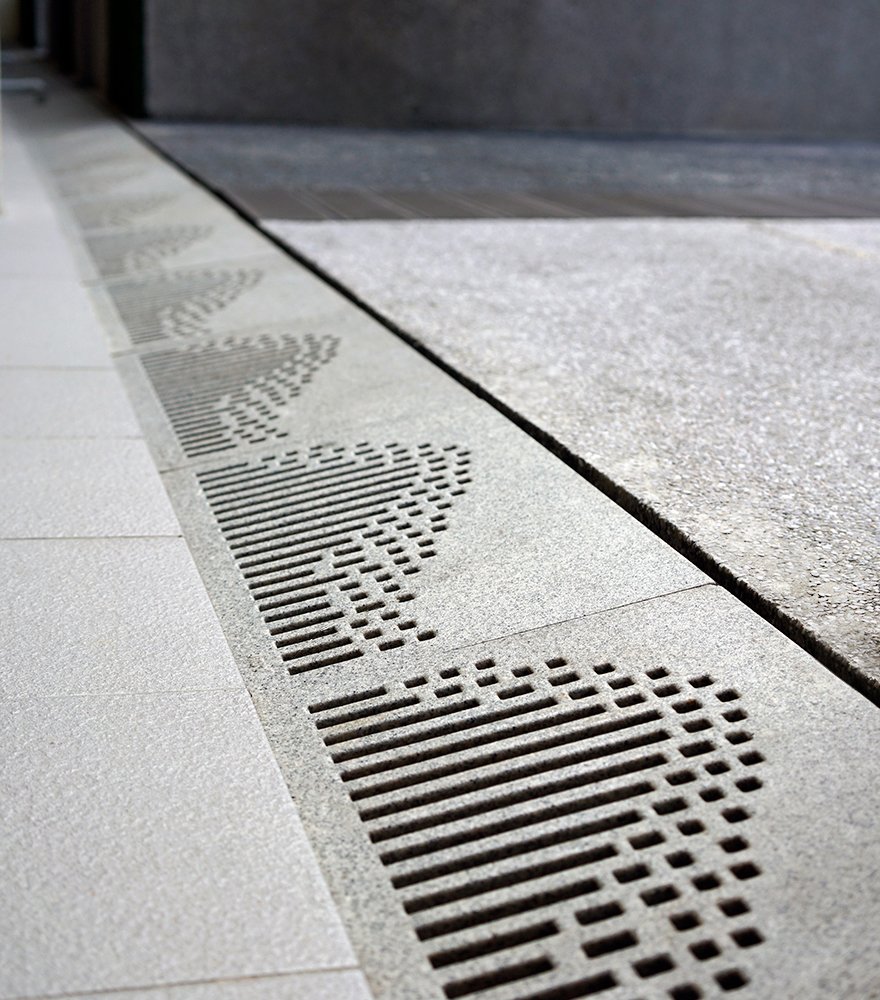 Jonite stone grates outside of Singapore Poly