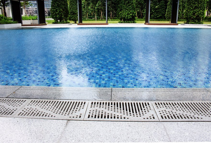 Jonite stone pool grates at the edge of a pool at 57 Grange Road