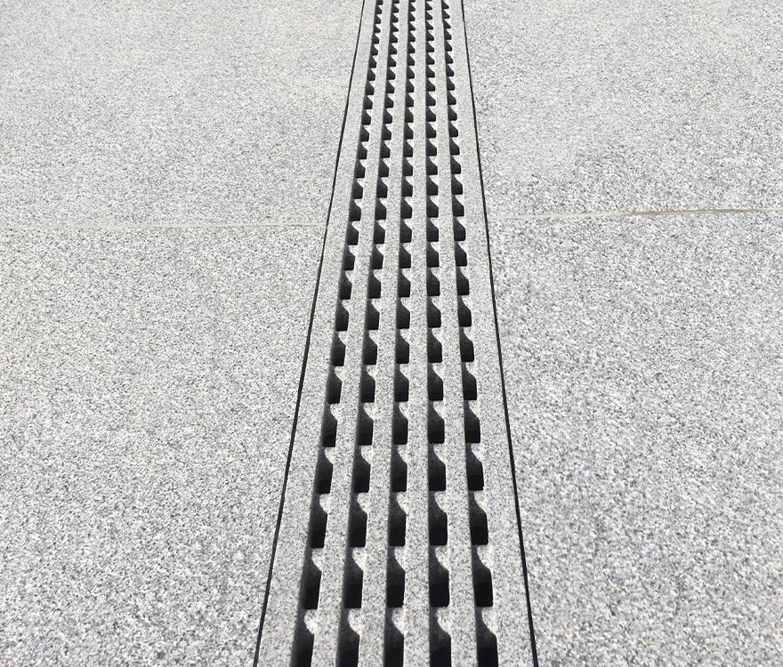 Jonite contemporary stone reinforced trench grates