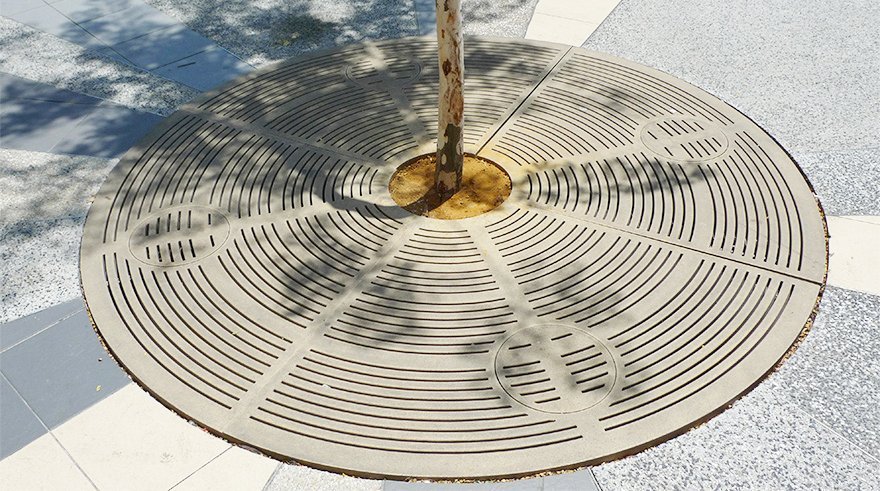 Jonite Projects - Modern reconstituted stone composite tree grates with expandable inner diameter