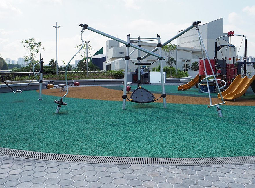 Jonite channel grates trench grates blending in at outdoor playground Singapore Sports Hub