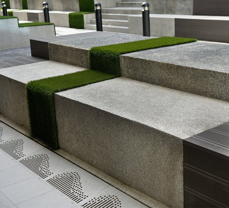 Jonite stone grates at the bottom of stone steps at Singapore Poly