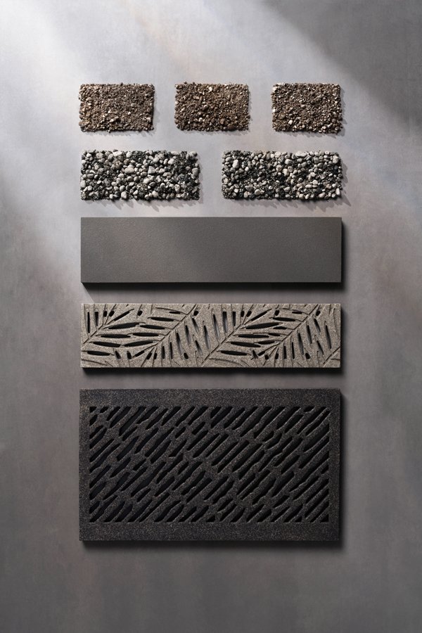 Decorative reinforced stone custom grates and panels