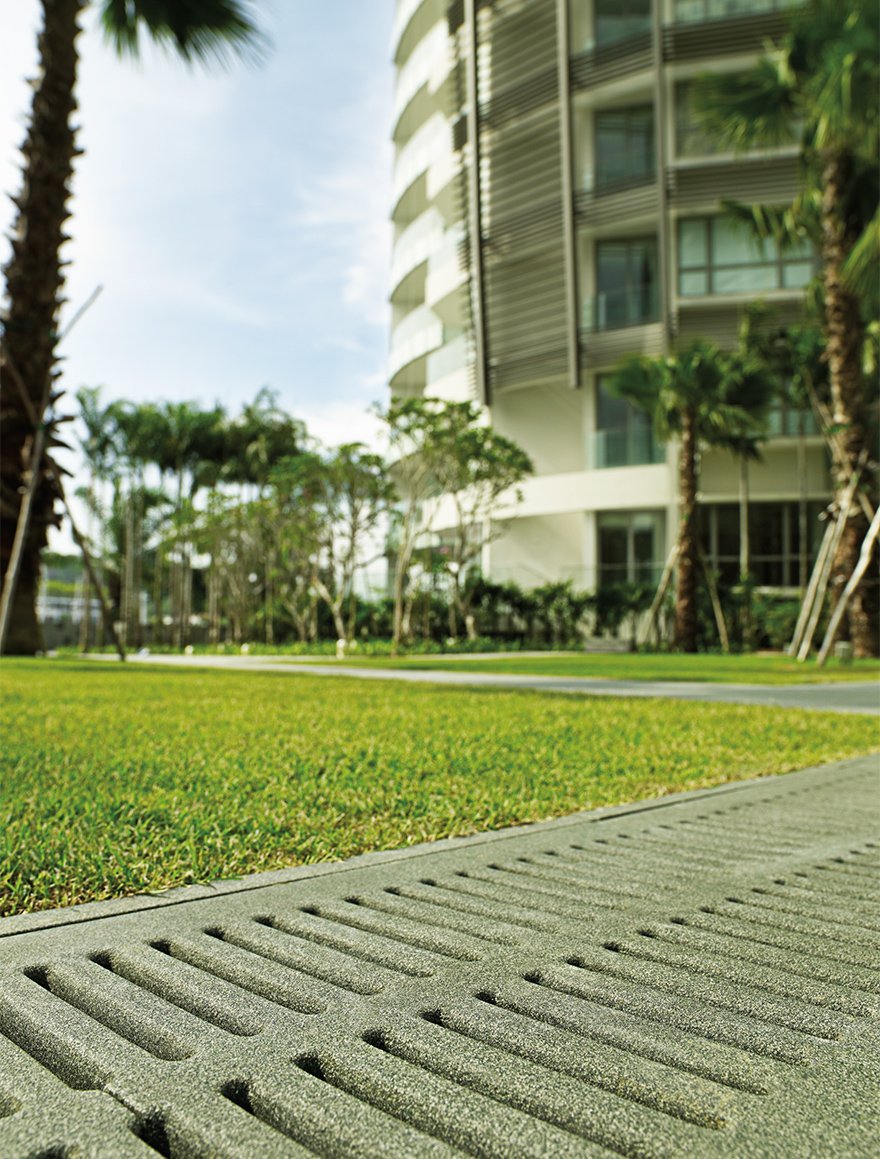 close up image of Jonite stone grate outside of W Residences