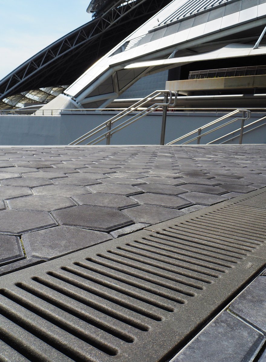 Jonite slotted collection channel trench grates at Singapore Sports Hub