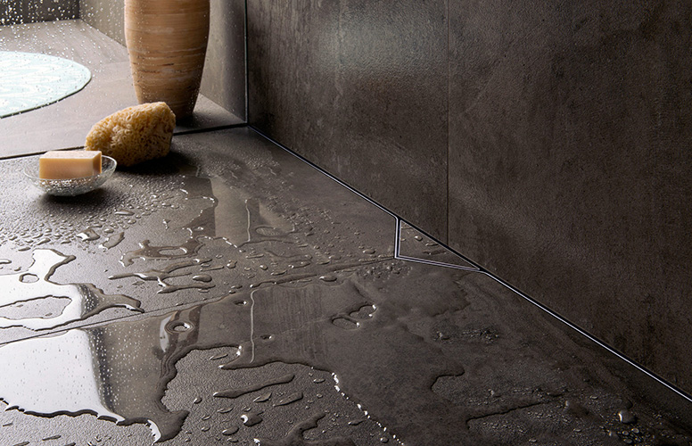 ESS shower board in the floor of a shower