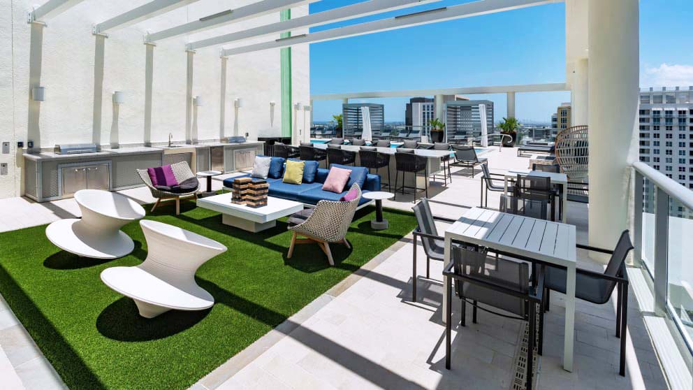 outdoor seating area with grill at 4 West Las Olas