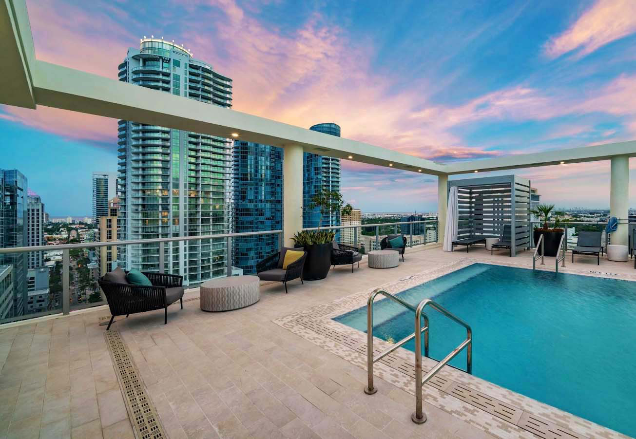 the pool at 4 West Las Olas during the evening