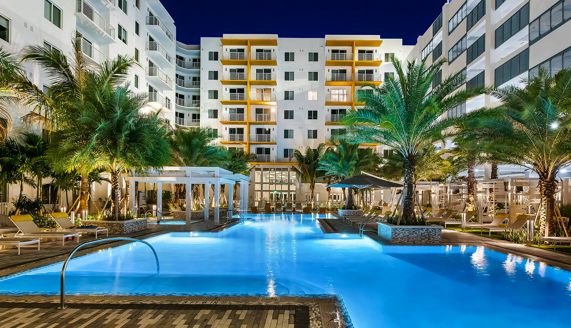 Aura Boca swimming pool at night