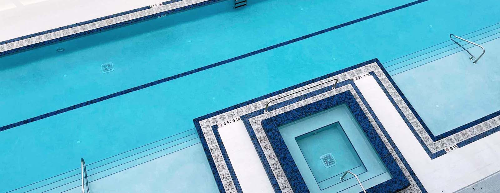 overhead view of a swimming pool and hot tub at Marina Bay 880